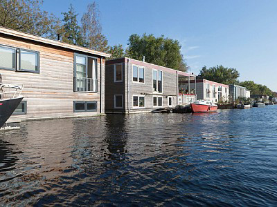 Case galleggianti sul fiume Amstel